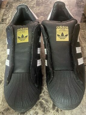 adidas Black Sneakers with White Stripes and Gold Logo